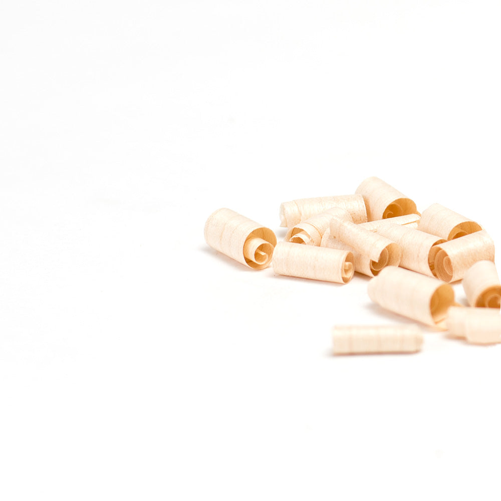 Wooden pieces on white background