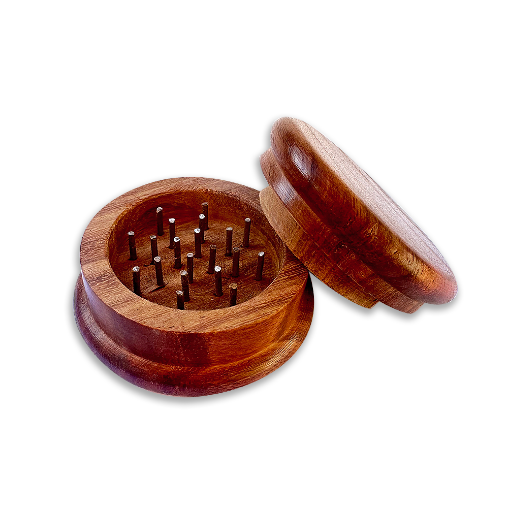 Wooden grinder with open lid on a white background