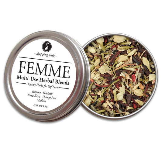 Metal tin of 'Femme' multi-use herbal blends with jasmine, hibiscus, kava, orange peel and mullein on a white background