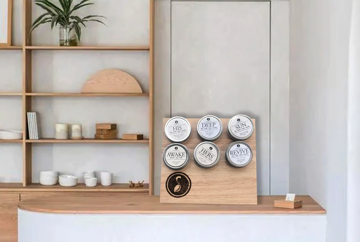 Wooden shelf with decorative items and a wall-mounted board with labeled containers.
