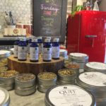 Herbal retail display of tins, elixirs and accessories