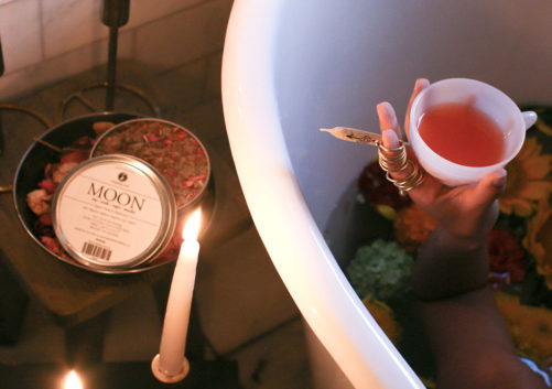 Teacup and preroll in a bathtub