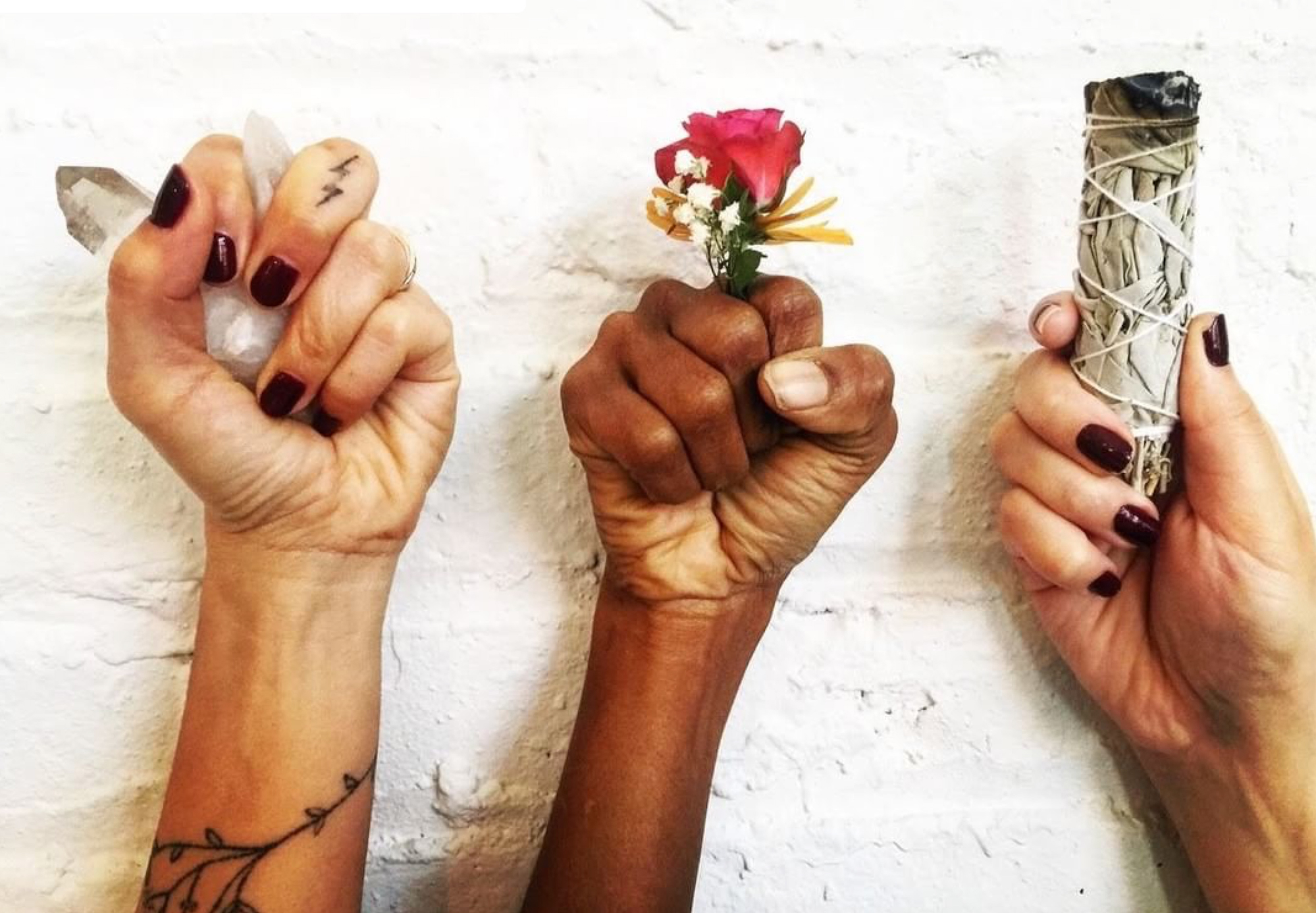Three POC hands for racial justice