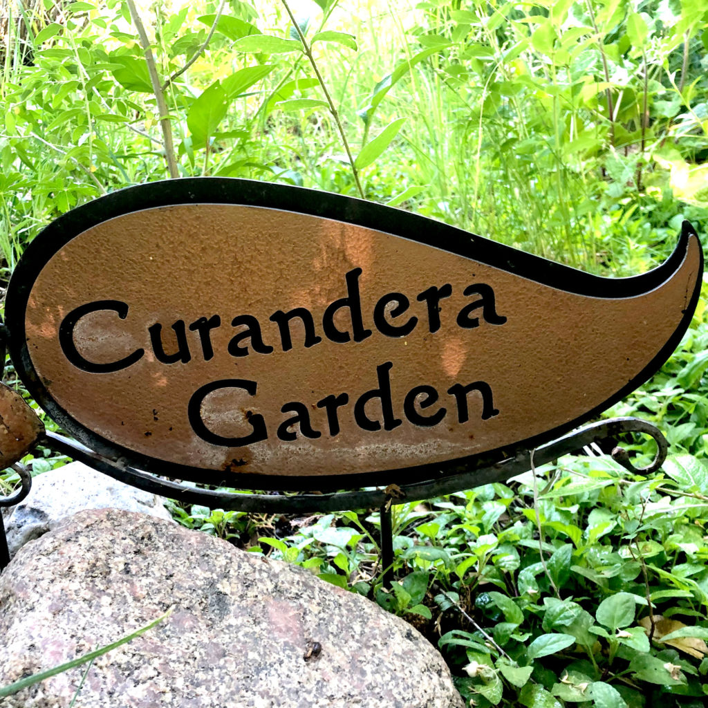 Curandera Garden sign.